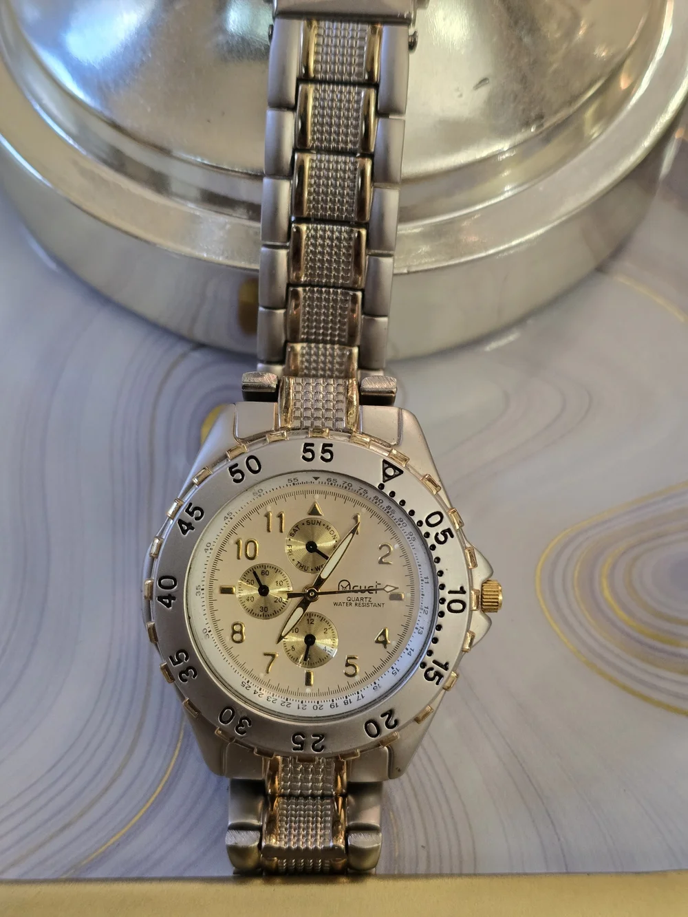 mcuci gold tone